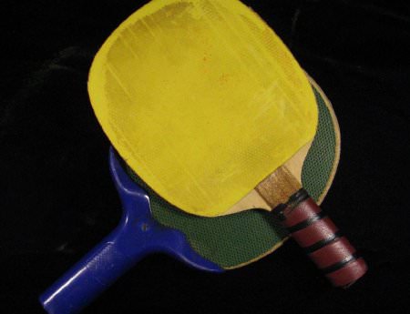 two table tennis paddles